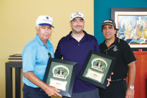 Ganadores de competencia de golf.